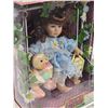 Image 3 : Classic Treasures, porcelain doll on swing - in box