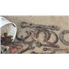 Image 7 : Bucket of some horseshoes and antique wrenches