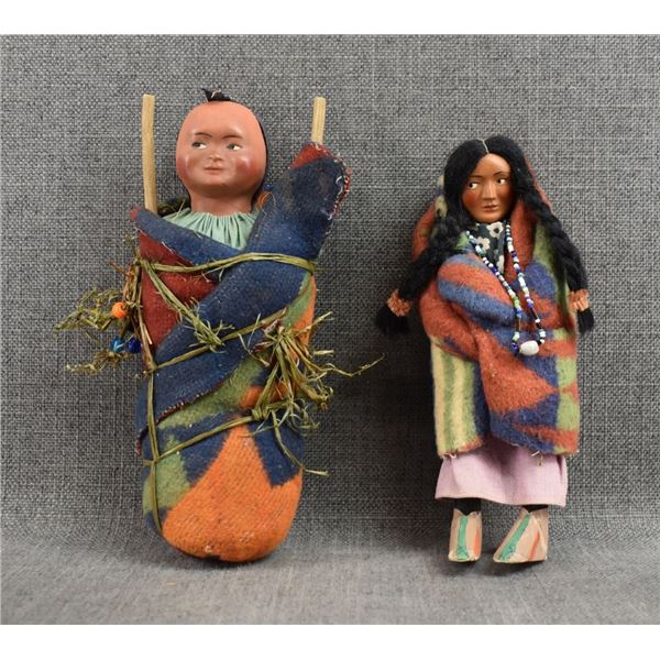 TWO SKOOKUM DOLLS
