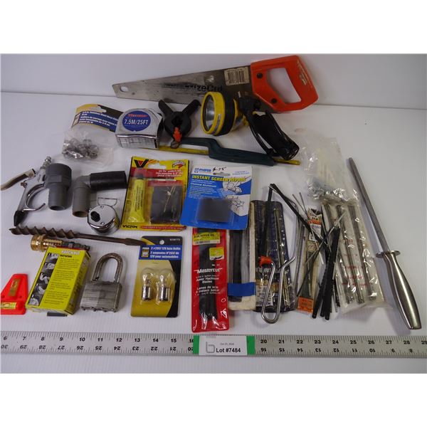 Several Pkgs. of Jigsaw Blades, Saw, Tape Measure, Lock and much more misc. items