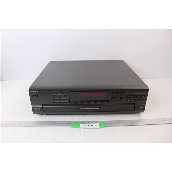Technocs Compact 5 Disc Rotary Changer System- As Is