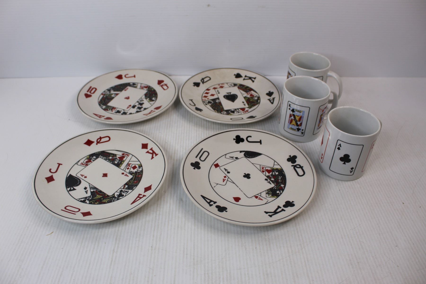 (4) Deco Art Playing Card Design P}lates w/ (3) Coffee Cups (1) Cup Is