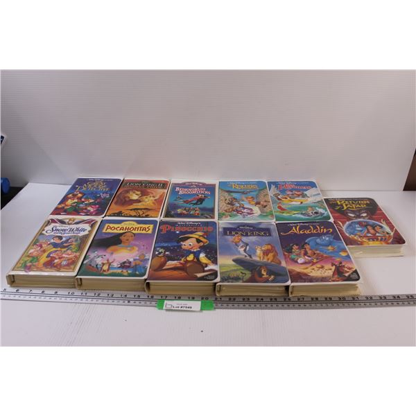 (11) Disney VHS Tapes: Pinocchio, Aladdin, Snow White, Misc.