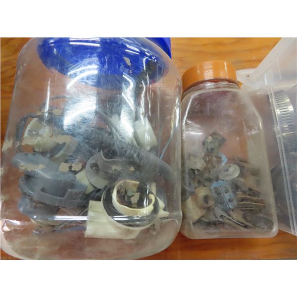 milk crate of assorted hardware and cotter pins