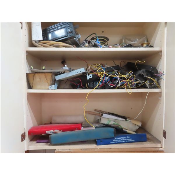 shelf of misc. ballast, Subaru stereo