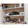 Image 1 : shelf of hardware, caulking, misc.