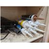 Image 3 : shelf of hardware, caulking, misc.
