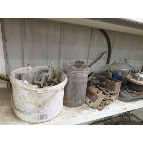 shelf of assorted automotive parts trailer parts