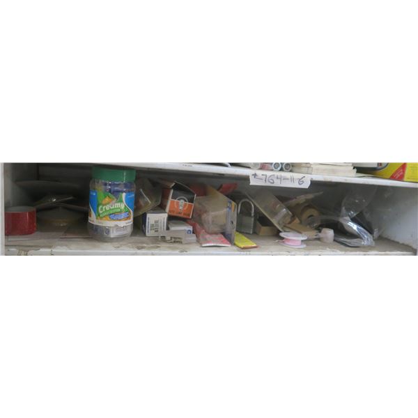 shelf of assorted hardware