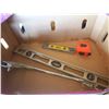 Image 1 : two level, a saw, tape mesaure