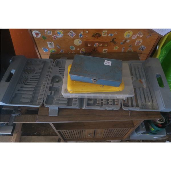 one tool case and three storage bins