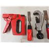 Image 2 : chisels , stapler , pipe cutter