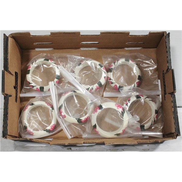 BOX OF WHITE FLORAL BRACELETS