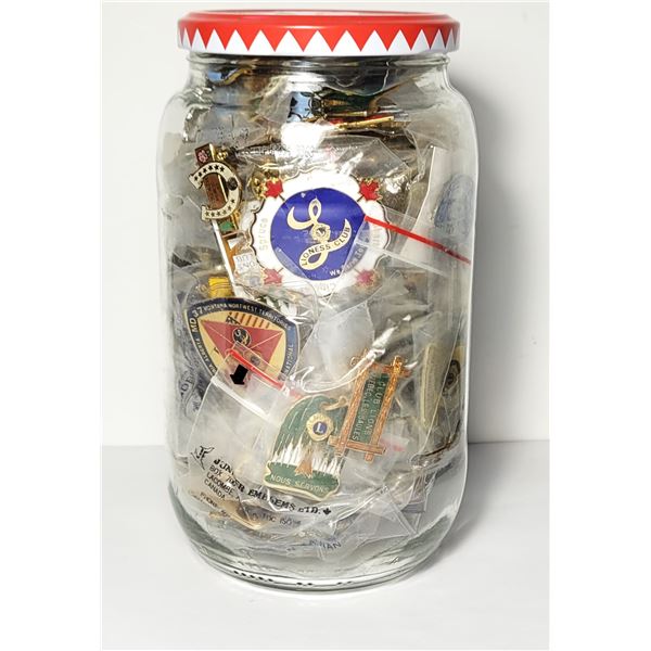 30)  JAR FILLED WITH ASSORTED LIONS CLUB LAPEL PIN