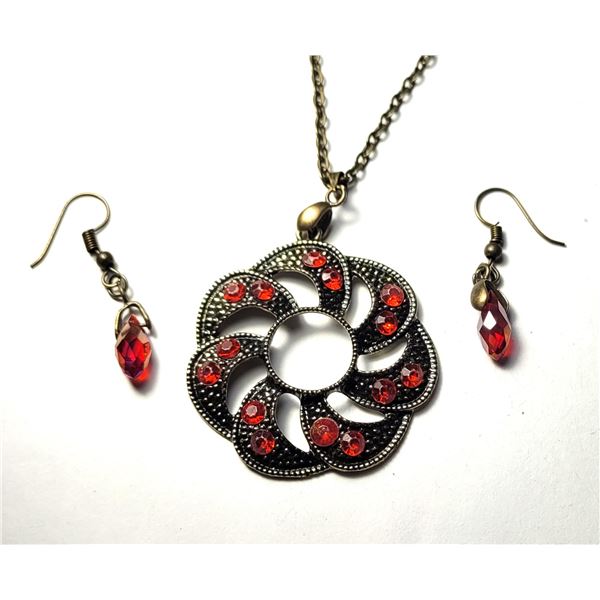 10)  BRONZE TONE PENDANT ON A 20" WITH A 3" EXTE