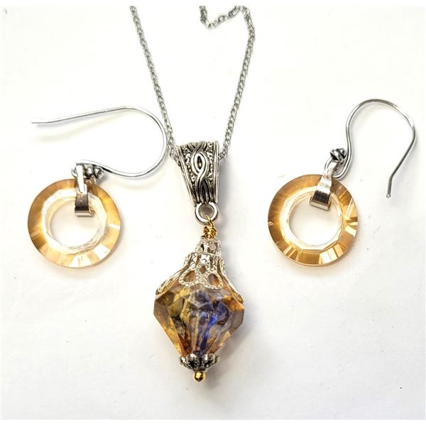 24)  CHAMPAGE COLORED TITANIUM CRYSTAL