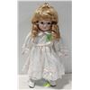 Image 1 : BLONDE PORCELAIN STANDING DOLL IN WHITE DRESS