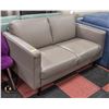 Image 1 : SHOWHOME GREY LEATHER LOVE SEAT 57" X 35" X 34"