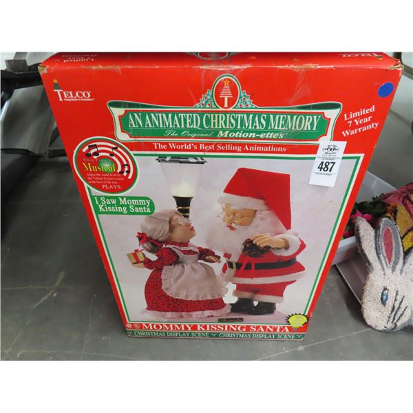 Animated Christmas Figurine Mommy Kissing Santa
