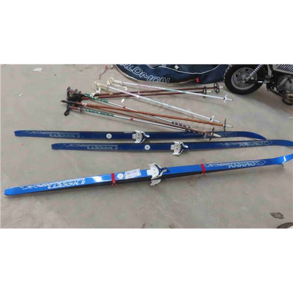2 Pairs of Skis , 4 Sets of Poles , Bag