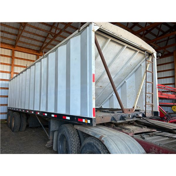 (Lot #s 280 & 281 are a Group Lot) 1997 Wilson tandem pup grain trailer, 28 ft c/w side chutes and a