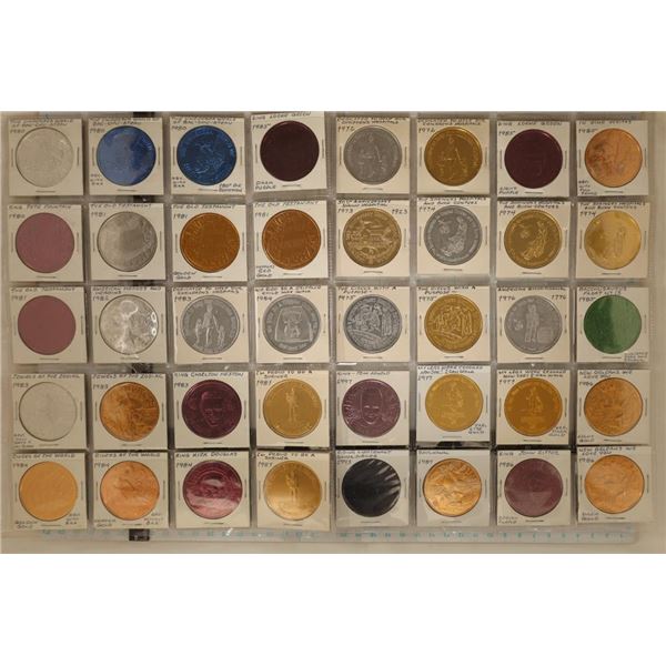 40 ASSORTED COLORIZED ALUMINUM MARDI GRAS TOKENS: