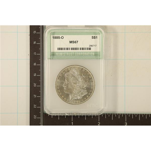 1885-O MORGAN SILVER DOLLAR IN A SLAB CLAIMING