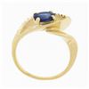 Image 7 : 14k Gold 0.80 ctw Oval Sapphire Solitaire Polished Grooved Open Loop Bypass Ring