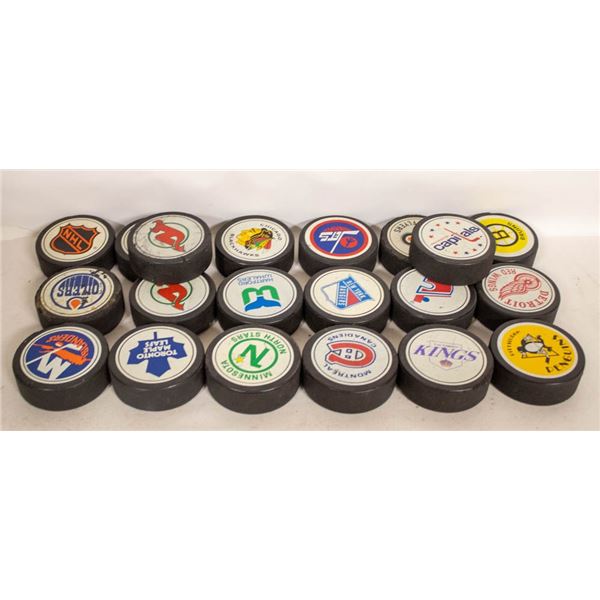 EARLY 1980'S HOCKEY PUCKS LOT