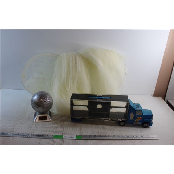 Mosquito Net, Truck Display Case and Spinning Globe