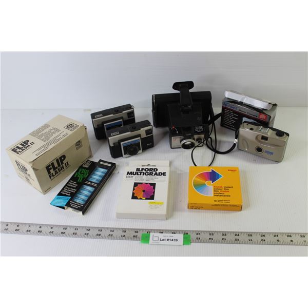 Polaroid Camera, Sakar 35mm Camera, (2) Instamatic X-15 Cameras, Flashes, Shades, Kodak Film (NIB)