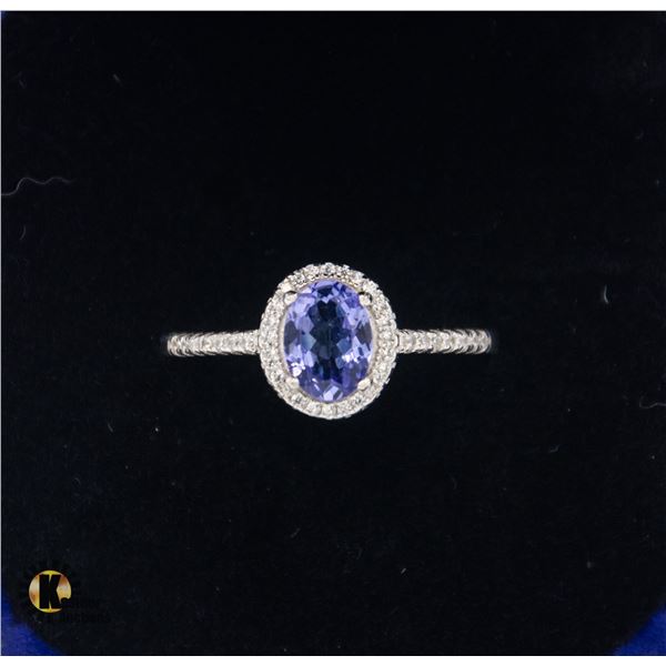 #855-0.85 CT OVAL TANZANITE SET IN CENTER OF