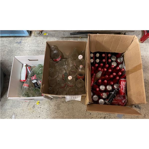 3 boxes of Coca-Cola bottles - assorted sizes