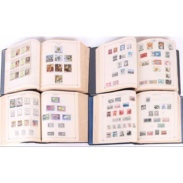 SCOTT INTERNATIONAL POSTAGE STAMP ALBUMS - (4)