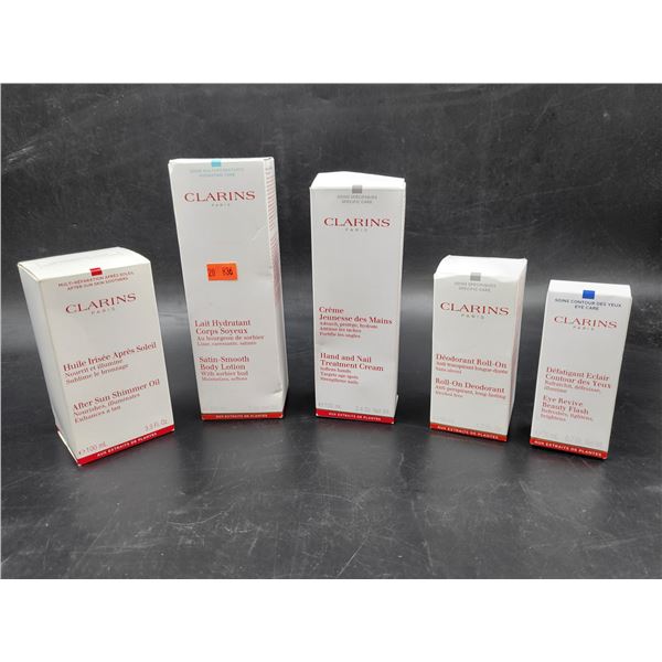 Clarins Shimmer Oil, Body Lotion, Hand/Nail Cream, Deodorant, & Eye Revive