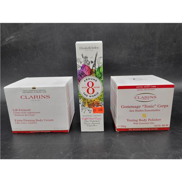 Clarins Extra Firming Body Cream, Toning Body Polisher, & Elizabeth Arden Eight Hour Cream