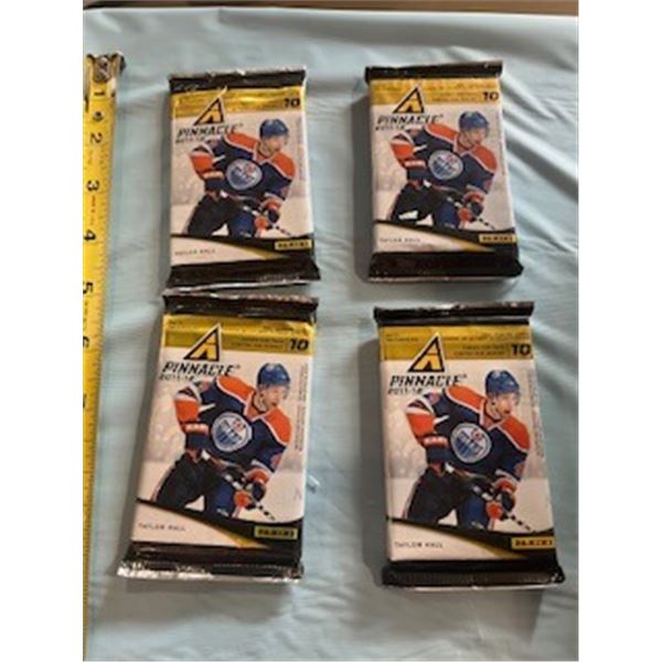 4 - Pinnacle 2011/12 packs - 10 per
