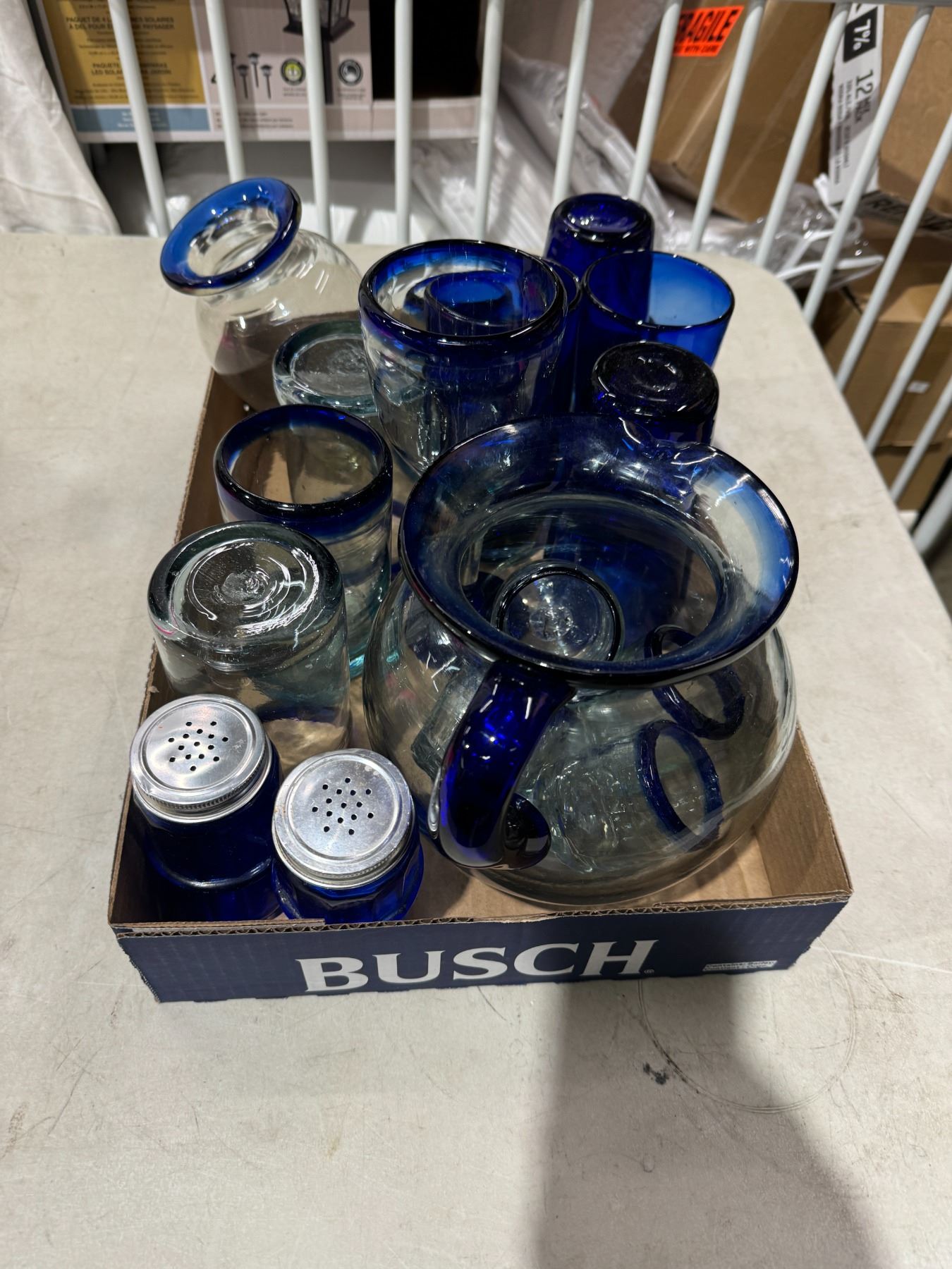 Glasses, pitcher, and condiment shakers