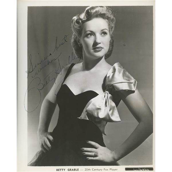Betty Grable signed photo. GFA Authenticated