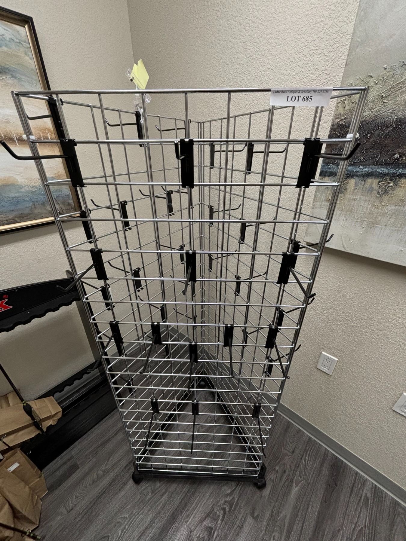 Rotating Triangle Display w Hooks - Beck Auctions Inc.