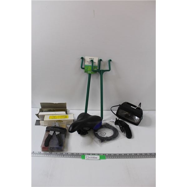 (2) Package of 'L' Cleat Nails, (2) Down Spout Supports, Bicycle Seat, 12v Plug in Light - as is, Mi