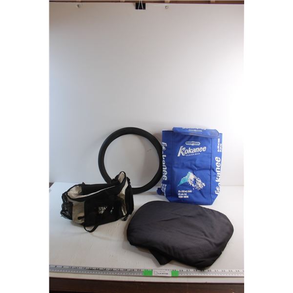 Seat Cushion, Steering Wheel Cover, Kokanee Backpack and a Bag