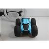 Image 10 : RCA Remote, Battery Operated R/C Car Toy with a Remote, Marbles, Joysticks and Ring Light - As Is