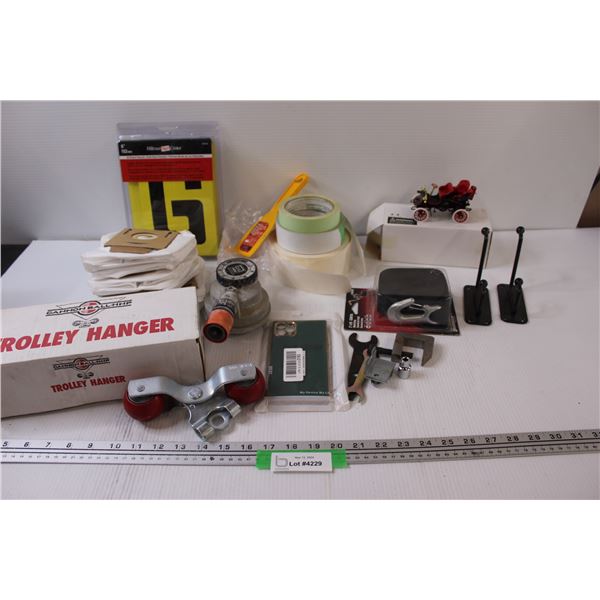 Lot: 1903 Cadillac Model Car, Letter Stencils Set, Trolley Hangers, Water Pump Timer, Hooks, Drywall