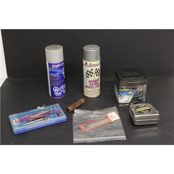 (2) Cans Of Wheel Coating Paint, Tape Measure, Saw Blades, Bungee Cords, Geometry Set