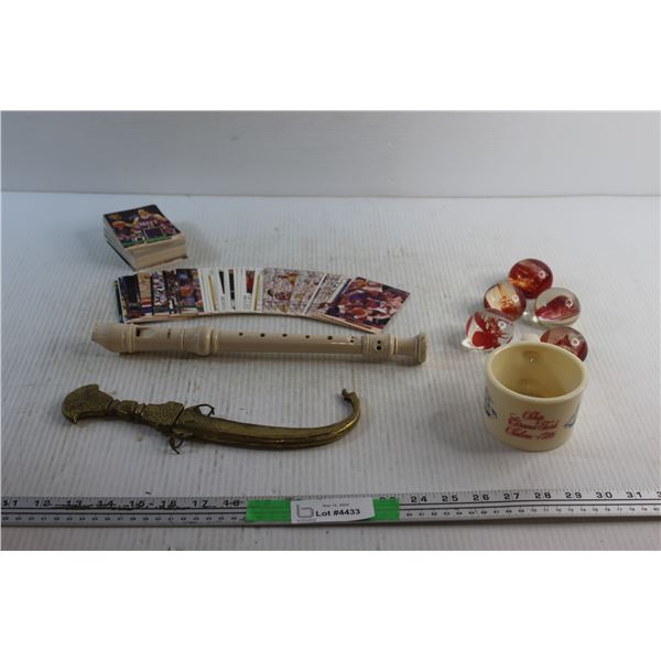 (6) Paper Weights, Flute, Brass Decorative Knife with Sheath, Basketball Cards and a Cup