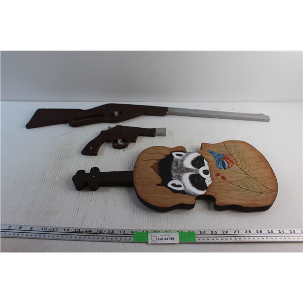 Wooden Guns and Guitar Decor