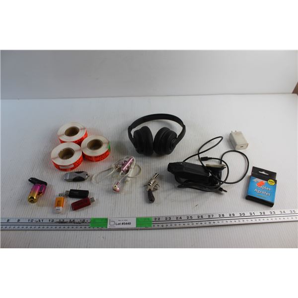 USB Flash Drives, Wireless Headphones, Dash Cam, Charging Block, Lighter and Misc.