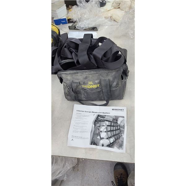 INTERIOR CARGO RESTAINT SYSTEM