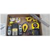 Image 1 : ASSORTED TAPE MEASSURES, STUD FINDERS. AND LASER LEVELS